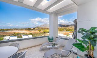 Move-in ready! Modern, luxurious penthouse for sale bordering the golf course, with sea and golf views, East Marbella 62307 