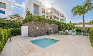 Move-in ready! Modern, luxurious penthouse for sale bordering the golf course, with sea and golf views, East Marbella 62314 