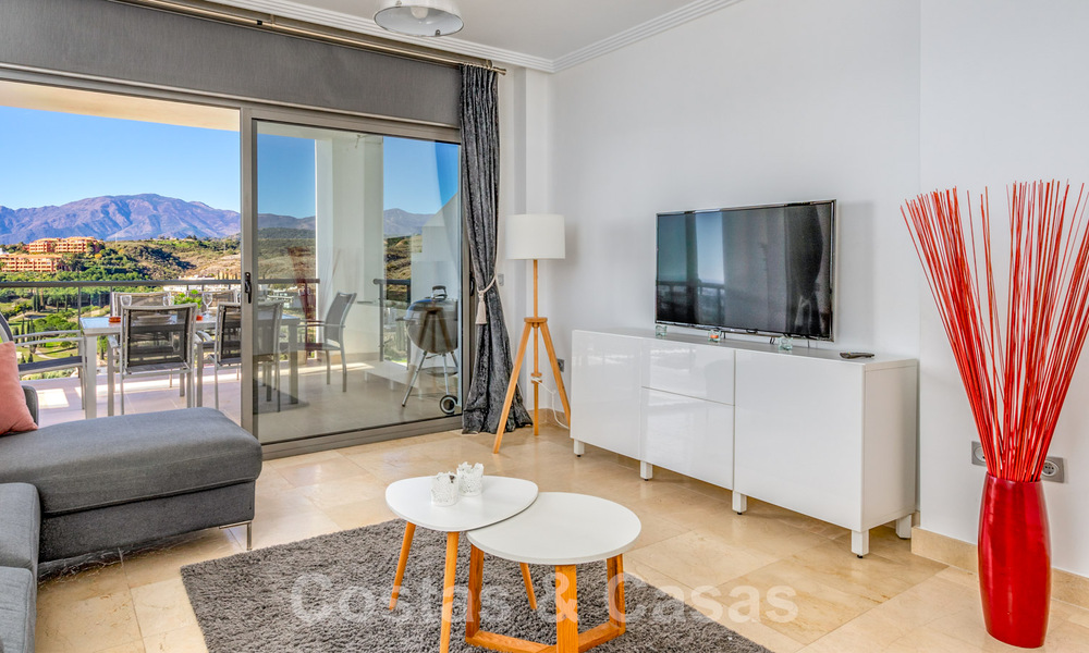 Spacious, modern apartment for sale with panoramic golf and sea views in a five-star golf resort in Benahavis - Marbella 62327