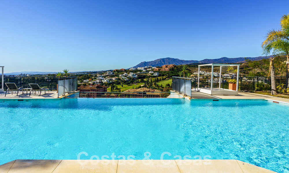Spacious, modern apartment for sale with panoramic golf and sea views in a five-star golf resort in Benahavis - Marbella 62343