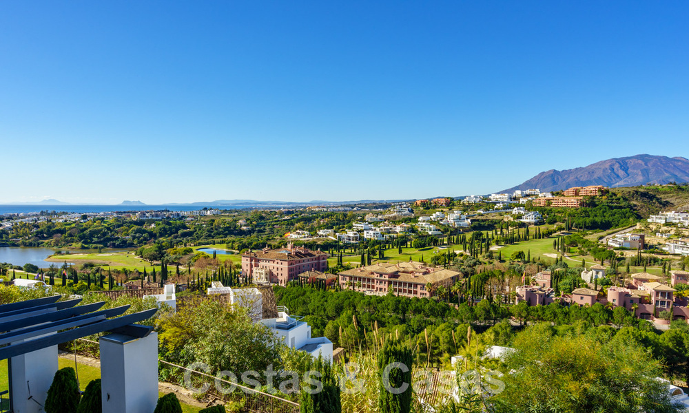 Spacious, modern apartment for sale with panoramic golf and sea views in a five-star golf resort in Benahavis - Marbella 62345