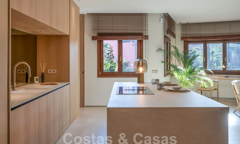 Modern renovated garden apartment for sale in an exclusive frontline beach complex on the New Golden Mile between Marbella and Estepona 62616