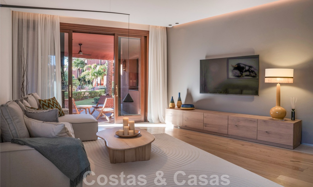 Modern renovated garden apartment for sale in an exclusive frontline beach complex on the New Golden Mile between Marbella and Estepona 62628