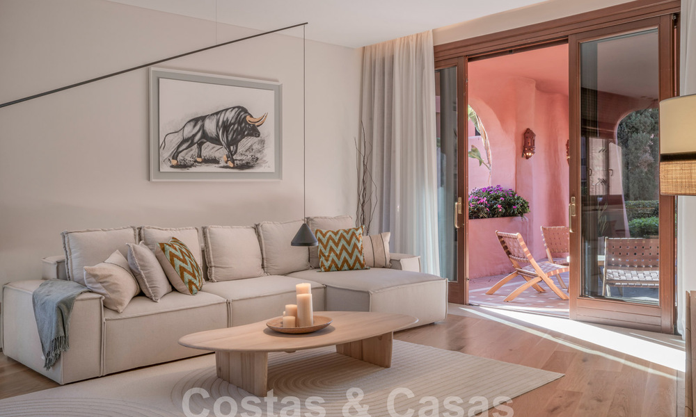 Modern renovated garden apartment for sale in an exclusive frontline beach complex on the New Golden Mile between Marbella and Estepona 62630