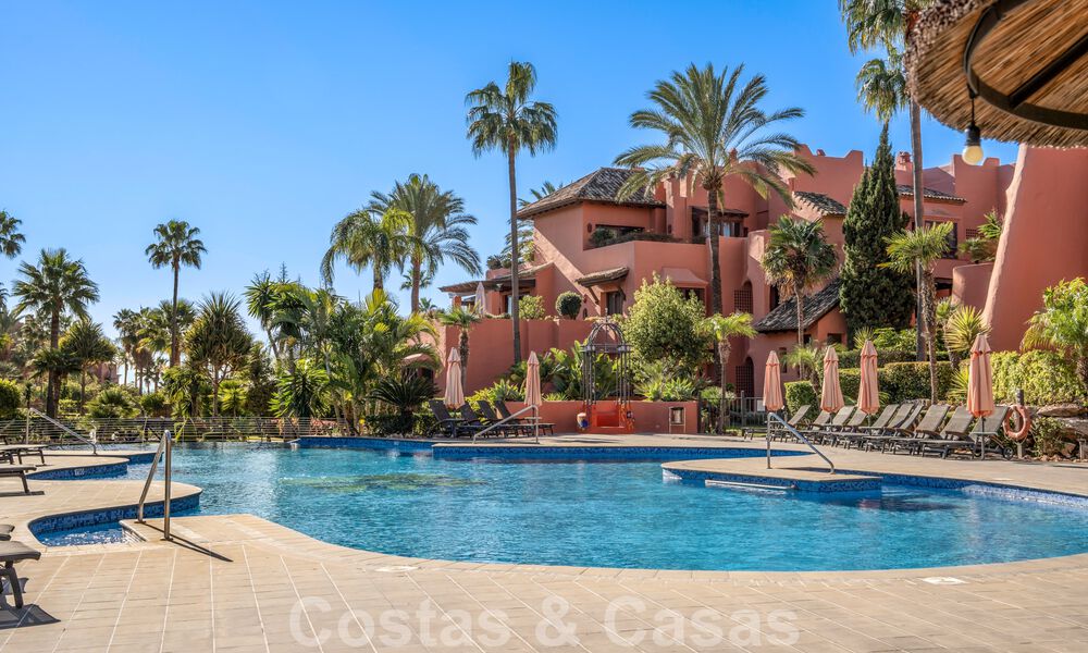 Modern renovated garden apartment for sale in an exclusive frontline beach complex on the New Golden Mile between Marbella and Estepona 62631