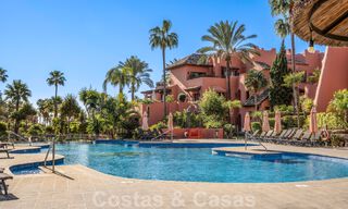 Modern renovated garden apartment for sale in an exclusive frontline beach complex on the New Golden Mile between Marbella and Estepona 62631 
