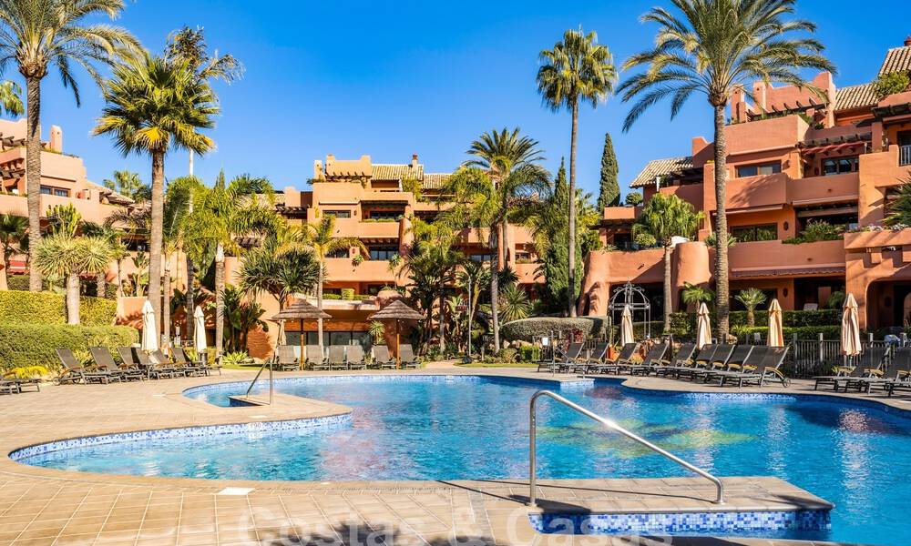 Modern renovated garden apartment for sale in an exclusive frontline beach complex on the New Golden Mile between Marbella and Estepona 62632