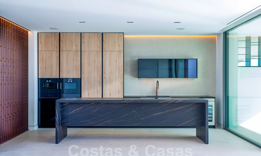 Turnkey luxury villas for sale in a new innovative complex consisting of 12 sophisticated villas with sea views, on Marbella's Golden Mile 62665