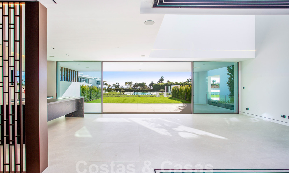 Turnkey luxury villas for sale in a new innovative complex consisting of 12 sophisticated villas with sea views, on Marbella's Golden Mile 62669
