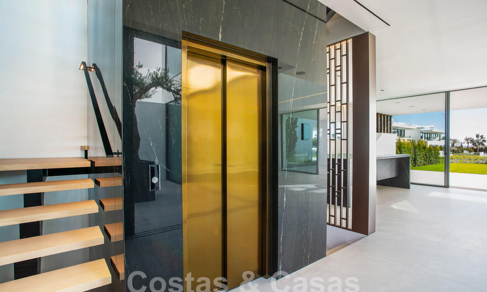 Turnkey luxury villas for sale in a new innovative complex consisting of 12 sophisticated villas with sea views, on Marbella's Golden Mile 62670