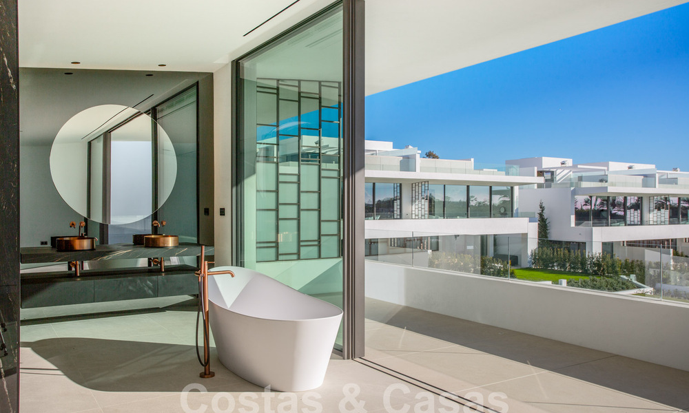Turnkey luxury villas for sale in a new innovative complex consisting of 12 sophisticated villas with sea views, on Marbella's Golden Mile 62677