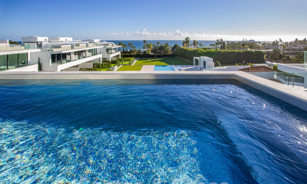 Turnkey luxury villas for sale in a new innovative complex consisting of 12 sophisticated villas with sea views, on Marbella's Golden Mile 62686