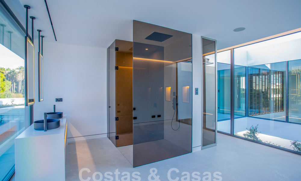 Turnkey luxury villas for sale in a new innovative complex consisting of 12 sophisticated villas with sea views, on Marbella's Golden Mile 62691