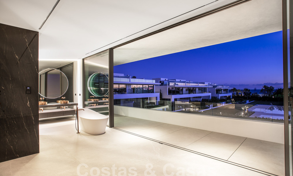 Turnkey luxury villas for sale in a new innovative complex consisting of 12 sophisticated villas with sea views, on Marbella's Golden Mile 62704