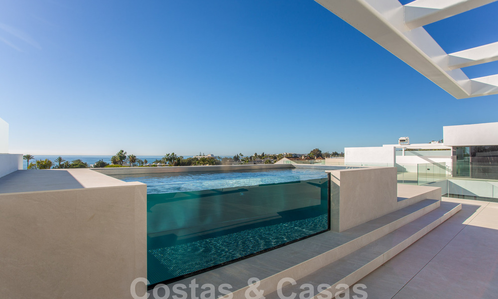 Turnkey luxury villas for sale in a new innovative complex consisting of 12 sophisticated villas with sea views, on Marbella's Golden Mile 62708