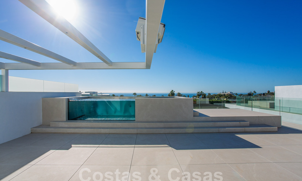 Turnkey luxury villas for sale in a new innovative complex consisting of 12 sophisticated villas with sea views, on Marbella's Golden Mile 62710
