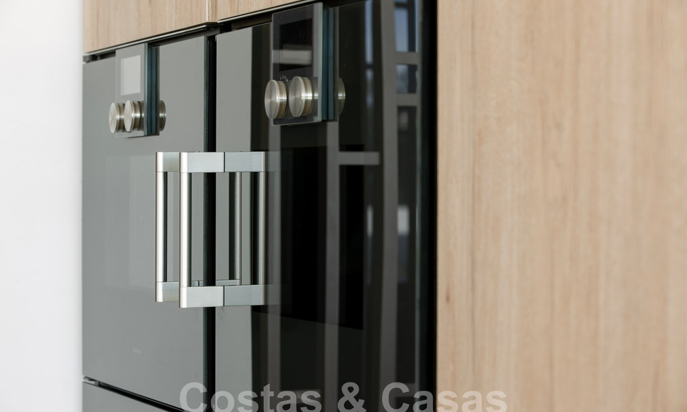 Turnkey luxury villas for sale in a new innovative complex consisting of 12 sophisticated villas with sea views, on Marbella's Golden Mile 62721