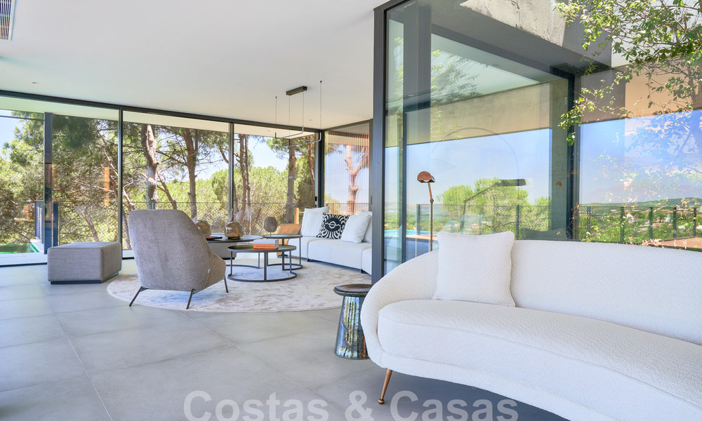 Designer villa with cutting-edge architecture for sale located in a green area of Sotogrande, Costa del Sol 62857