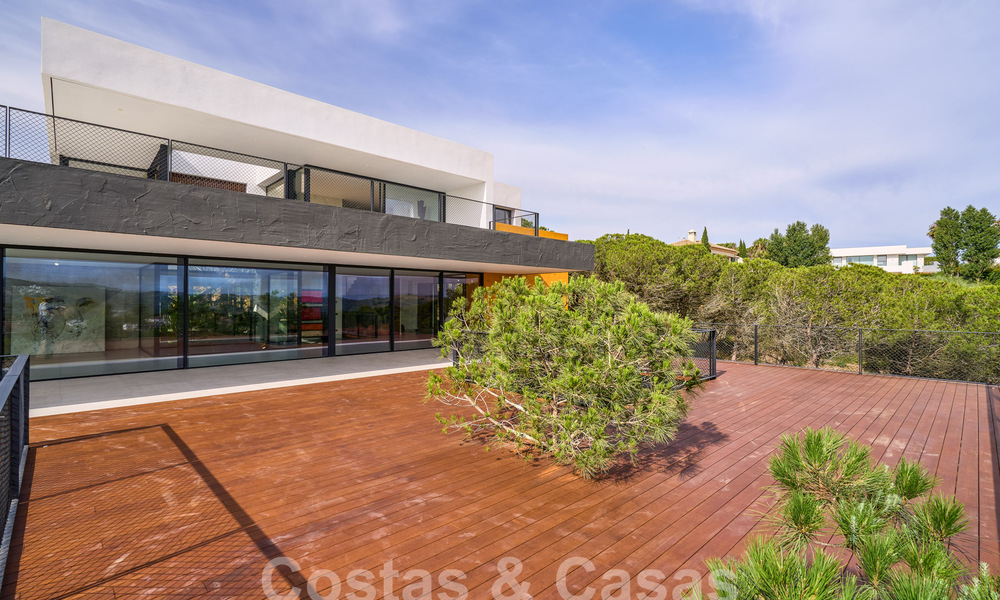 Designer villa with cutting-edge architecture for sale located in a green area of Sotogrande, Costa del Sol 62861