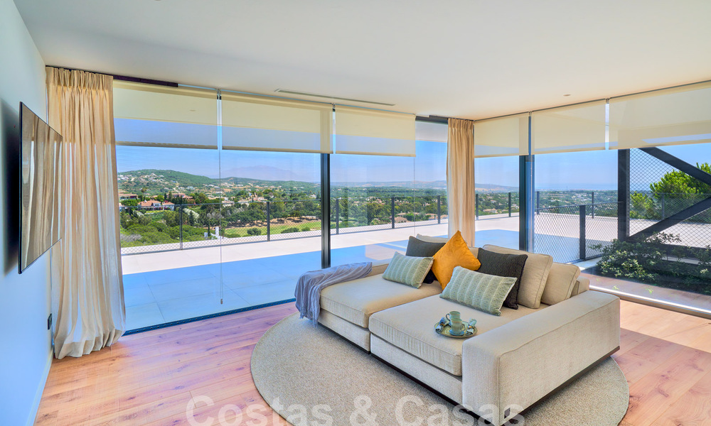 Designer villa with cutting-edge architecture for sale located in a green area of Sotogrande, Costa del Sol 62875