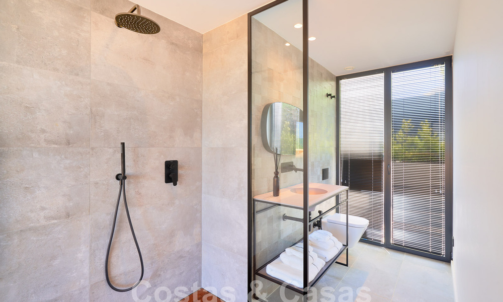 Designer villa with cutting-edge architecture for sale located in a green area of Sotogrande, Costa del Sol 62887