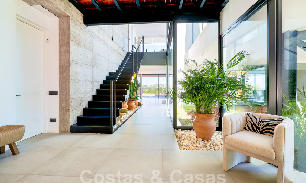 Designer villa with cutting-edge architecture for sale located in a green area of Sotogrande, Costa del Sol 62890