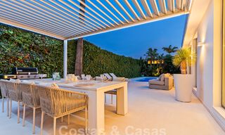 Modern luxury villa for sale with contemporary Mediterranean architecture located in Nueva Andalucia's golf valley, Marbella 62990 