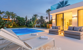 Modern luxury villa for sale with contemporary Mediterranean architecture located in Nueva Andalucia's golf valley, Marbella 62991 