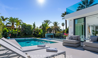 Modern luxury villa for sale with contemporary Mediterranean architecture located in Nueva Andalucia's golf valley, Marbella 62998 