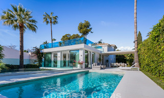 Modern luxury villa for sale with contemporary Mediterranean architecture located in Nueva Andalucia's golf valley, Marbella 62999 