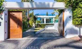 Modern luxury villa for sale with contemporary Mediterranean architecture located in Nueva Andalucia's golf valley, Marbella 63002 