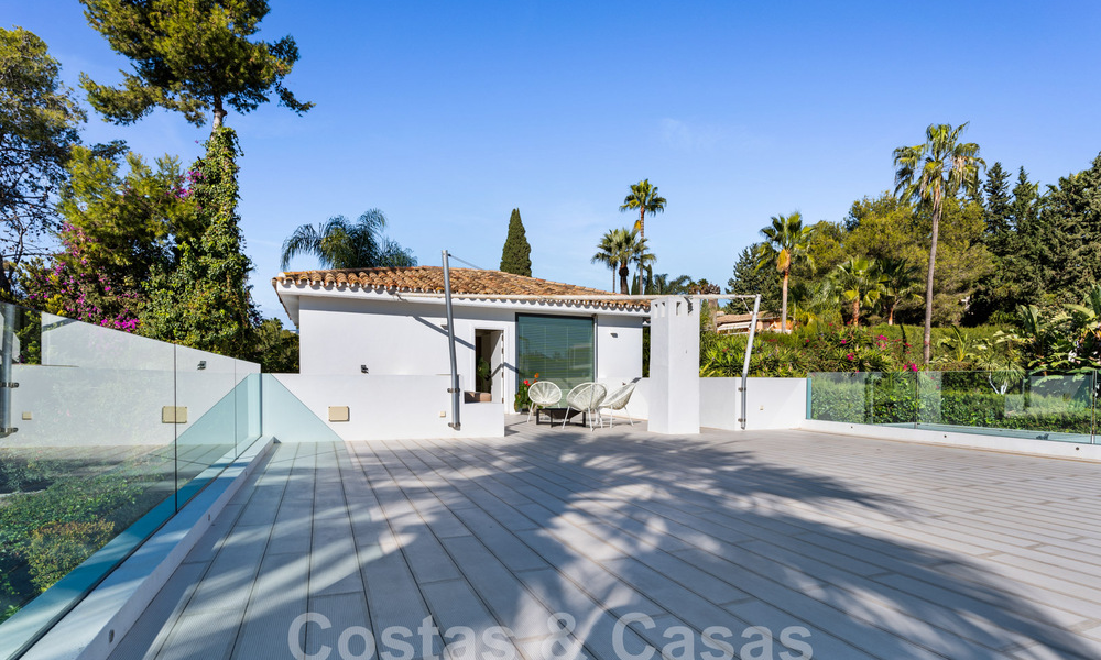 Modern luxury villa for sale with contemporary Mediterranean architecture located in Nueva Andalucia's golf valley, Marbella 63004