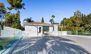 Modern luxury villa for sale with contemporary Mediterranean architecture located in Nueva Andalucia's golf valley, Marbella 63004 