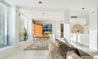 Modern luxury villa for sale with contemporary Mediterranean architecture located in Nueva Andalucia's golf valley, Marbella 63007 