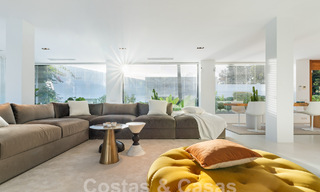 Modern luxury villa for sale with contemporary Mediterranean architecture located in Nueva Andalucia's golf valley, Marbella 63010 