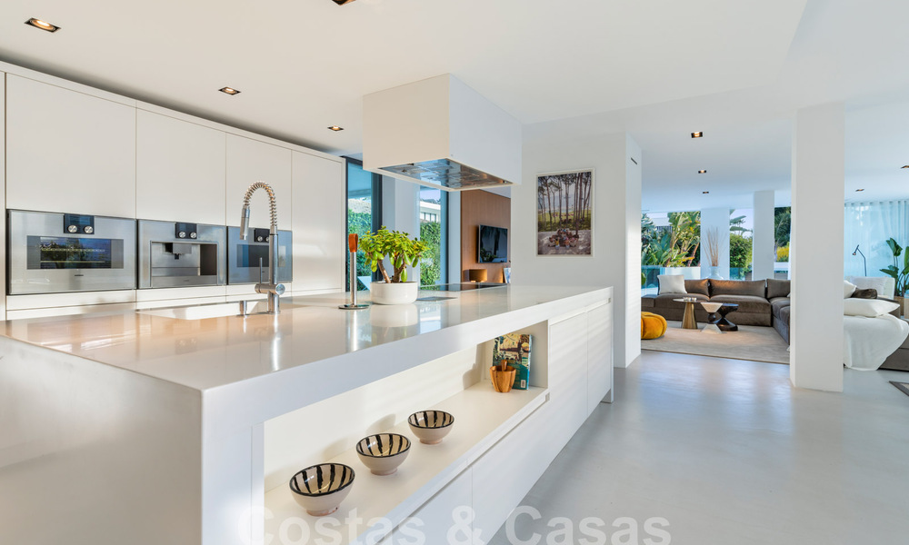Modern luxury villa for sale with contemporary Mediterranean architecture located in Nueva Andalucia's golf valley, Marbella 63013