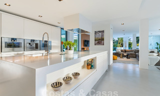 Modern luxury villa for sale with contemporary Mediterranean architecture located in Nueva Andalucia's golf valley, Marbella 63013 