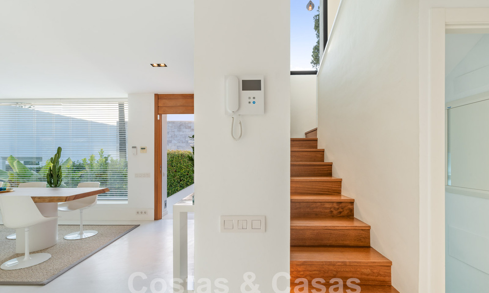 Modern luxury villa for sale with contemporary Mediterranean architecture located in Nueva Andalucia's golf valley, Marbella 63014