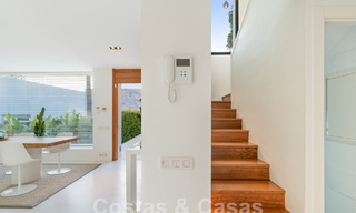 Modern luxury villa for sale with contemporary Mediterranean architecture located in Nueva Andalucia's golf valley, Marbella 63014 