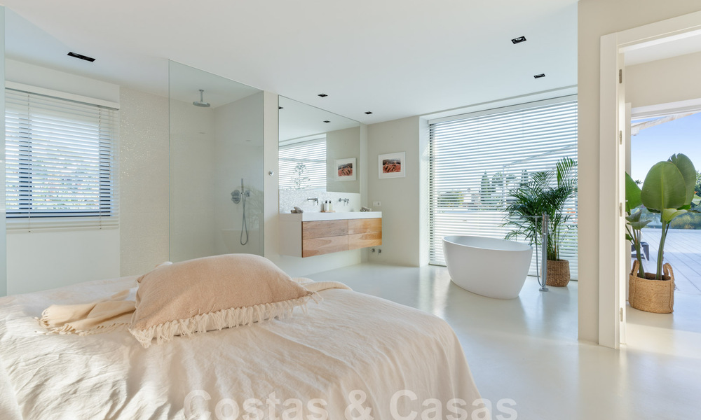 Modern luxury villa for sale with contemporary Mediterranean architecture located in Nueva Andalucia's golf valley, Marbella 63017