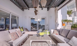 Modern apartment with spacious terrace for sale with sea views and close to golf courses in gated community in La Quinta, Marbella - Benahavis 62950 