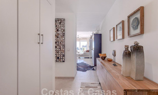 Modern apartment with spacious terrace for sale with sea views and close to golf courses in gated community in La Quinta, Marbella - Benahavis 62956 