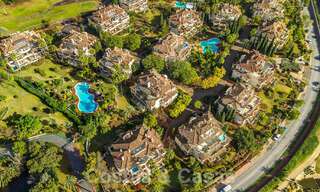 Spacious, luxury 4-bedroom penthouse for sale in frontline golf complex in Nueva Andalucia, Marbella 63051 