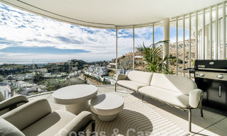 First-class, modern apartment for sale, with sea, golf and mountain views in Benahavis - Marbella 63144 