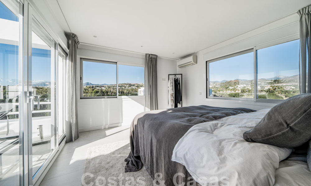 Luxurious duplex penthouse with contemporary interior for sale, frontline golf in Nueva Andalucia's golf valley, Marbella 63313