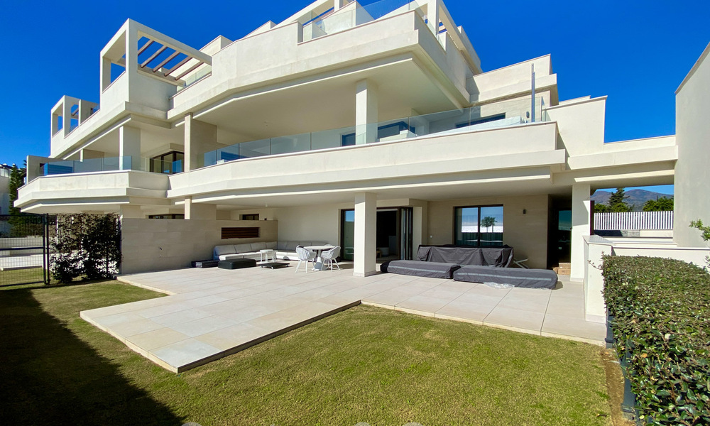 Modern garden apartment for sale with sea views in a luxury beach complex on the New Golden Mile, Marbella – Estepona 63413