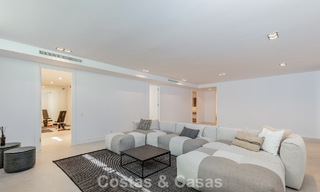 Modernist villa with sleek design and stunning sea views for sale in gated golf community in East Marbella 63578 