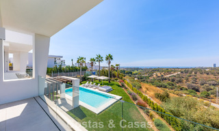 Modernist villa with sleek design and stunning sea views for sale in gated golf community in East Marbella 63587 