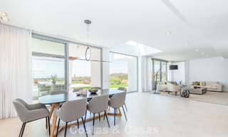 Modernist villa with sleek design and stunning sea views for sale in gated golf community in East Marbella 63594 