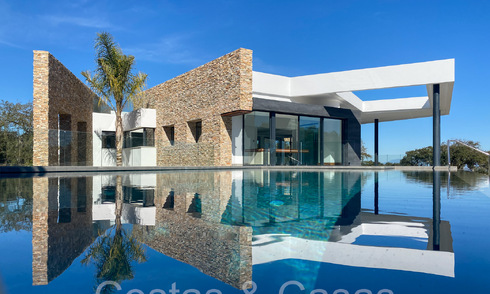 Sophisticated designer villa for sale directly on the golf course in a first class golf resort in the area of Sotogrande - San Roque, Costa del Sol 64001